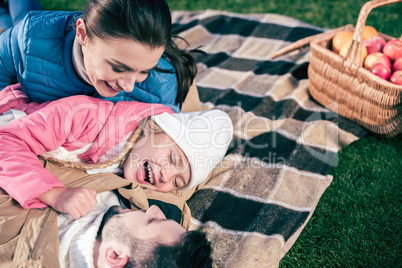 Happy family having fun in park