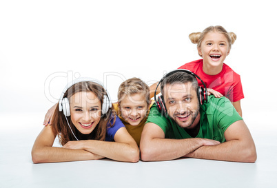 Parents in headphones with kids