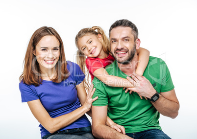 Young family in colorful t-shirts