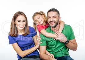 Young family in colorful t-shirts