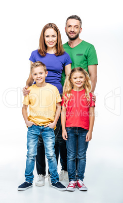 Happy family looking at camera