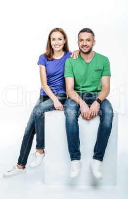 Young couple looking at camera