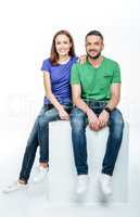 Young couple looking at camera