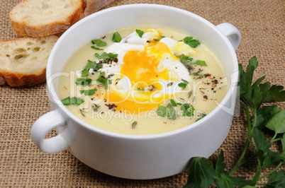 potato cream soup with poached eggs