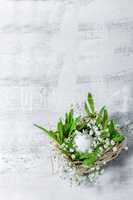 Egg with flowers on a white background. Easter Symbols.