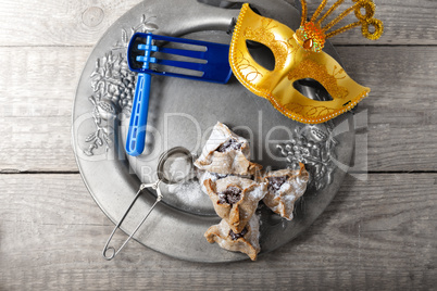 Jewish Pastry Hamantaschen with a mask