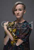 Young woman holding anaconda