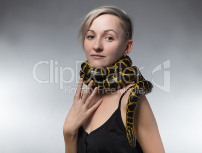 Woman and snake on her neck