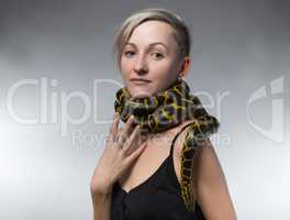 Woman and snake on her neck