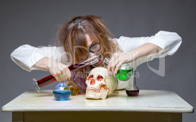 Mixing liquid professor with human skull