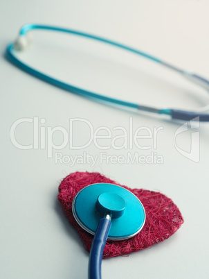 Red heart shape with stethoscope