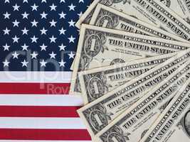 Dollar notes and flag of the United States