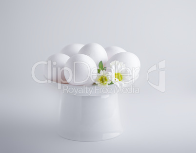 Eggs with flowers on a white background. Easter Symbols.