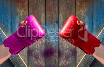 Two female hands in  boxing gloves