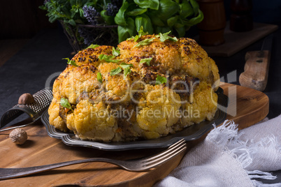 Stuffed cauliflower with mince and Hasselback potatoes
