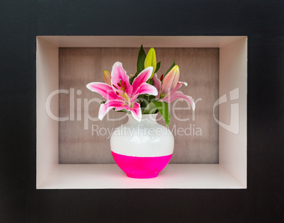 Giant white and pink lily in a white and pink vase