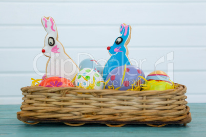 Various Easter eggs served in wicker basket