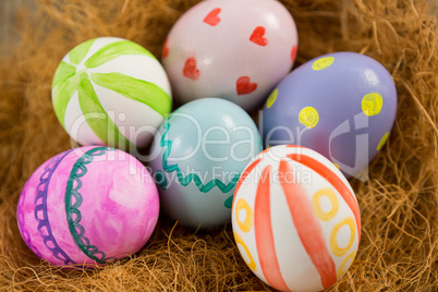 Painted Easter eggs in nest