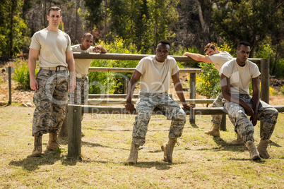 Military soldiers relaxing on fitness trail