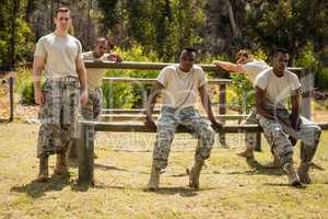 Military soldiers relaxing on fitness trail