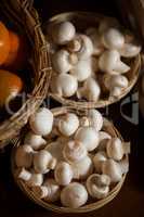 Close-up of fresh mushrooms in wicker basket