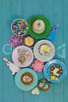 Various sweet foods and cookies in plate