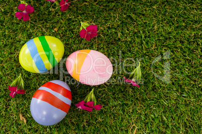 Painted Easter egg on grass