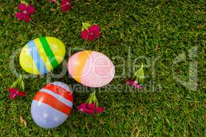 Painted Easter egg on grass