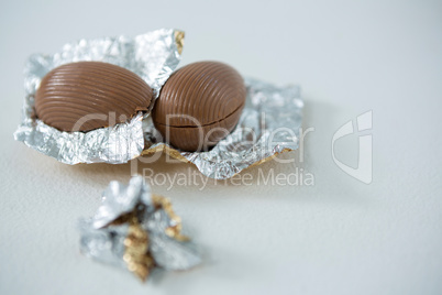 Chocolate Easter eggs on white background