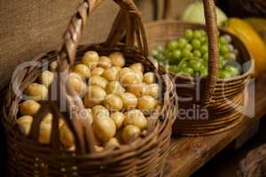 Basket full of grapes and potato at counter