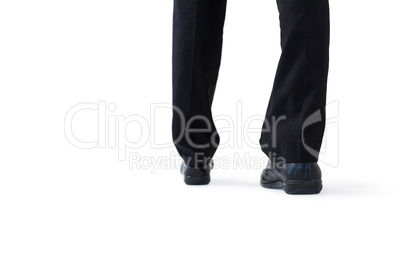 Businessman walking on while background