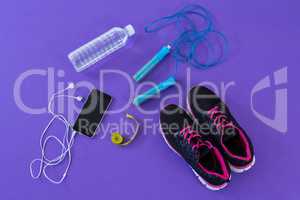 Fitness accessories, measuring tape and mobile phone with headphones