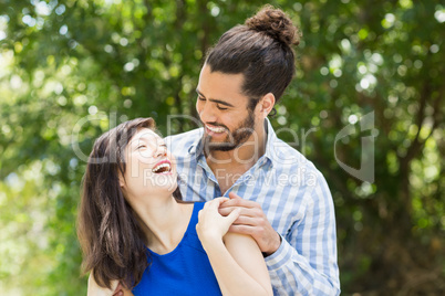 Couple enjoying together in a park