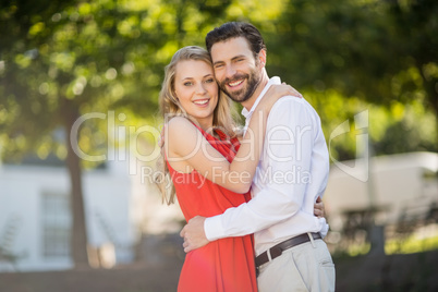 Couple hugging each other in the restaurant