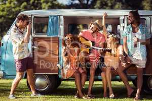 Group of friends having fun at music festival