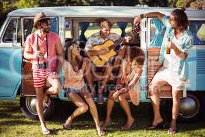 Group of friends having fun at music festival