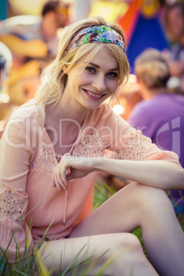 Portrait of woman sitting at campsite