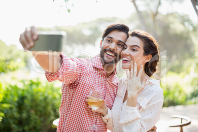 Happy couple taking a selfie