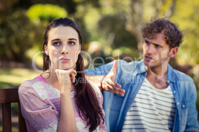 Couple arguing in park