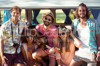 Group of friends having fun at music festival