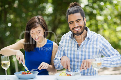 Couple having food in a restaurant