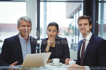 Portrait of smiling businesspeople