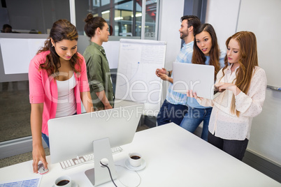 Attentive executives working in conference room