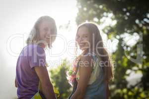 Young couple smiling in park