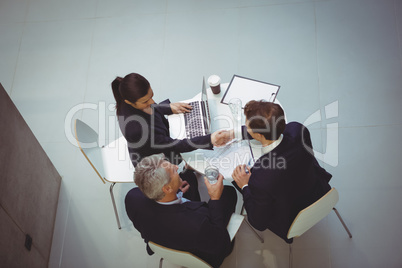 Businesspeople having a discussion in meeting