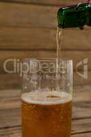 Beer being poured into a glass