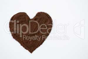 Coffee powder forming heart shape