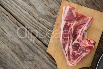 Blade chop on wooden tray against wooden background