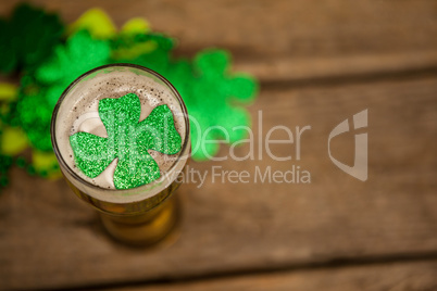 Glass of beer and shamrock for St Patricks Day