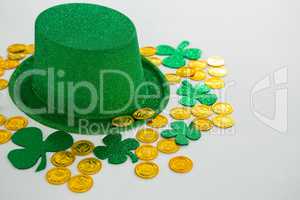 St. Patricks Day leprechaun hat, shamrocks and chocolate gold coins